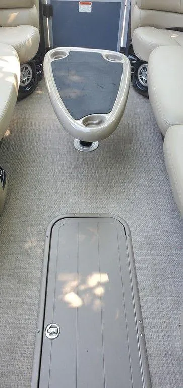 Slide: The Image of Interior of 2017 Regency 220 DL3 boat with seating and table. - 18