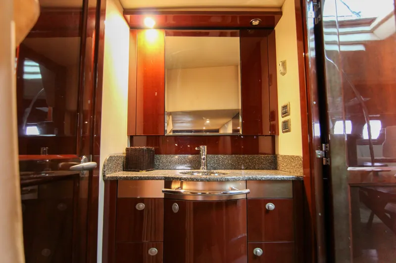 Slide: The Image of Luxurious bathroom interior of 2008 Sea Ray 48 Sundancer yacht with elegant wood finish. - 24
