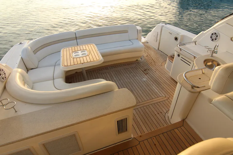 Slide: The Image of 2008 Sea Ray 48 Sundancer yacht with spacious deck and elegant seating area. - 38