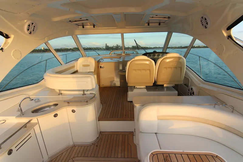 Slide: The Image of Luxurious interior of 2008 Sea Ray 48 Sundancer yacht with elegant seating and wood flooring. - 39