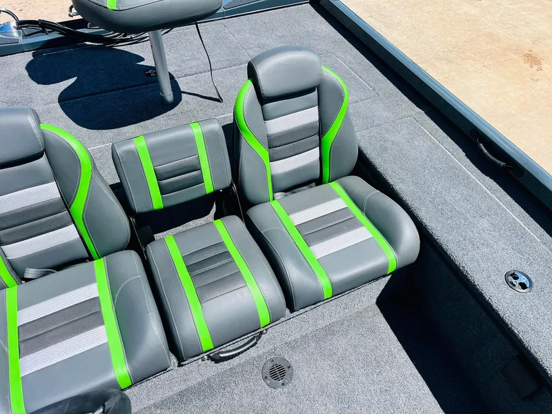 Slide: The Image of 2025 Ranger RT188C boat seats with green and gray accents, showcasing modern design. - 35