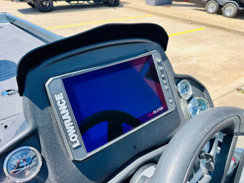 Slide: The Image of 2025 Ranger RT188C boat dashboard with Lowrance Elite fishfinder display. - 43