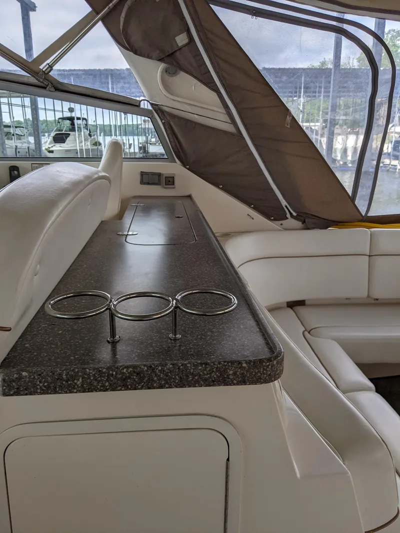 Slide: The Image of 2004 Rinker Fiesta Vee 410 interior with seating and countertop. - 44