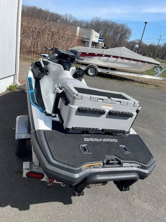 Slide: The Image of 2021 Sea-Doo Fish Pro™ iDF with Sound System on trailer, parked outdoors. - 4