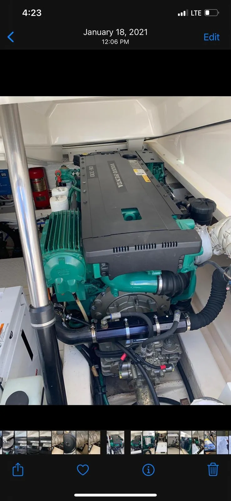 Slide: The Image of Engine compartment of a 2015 Tiara Yachts 3100 Coronet, showcasing marine engine details. - 16