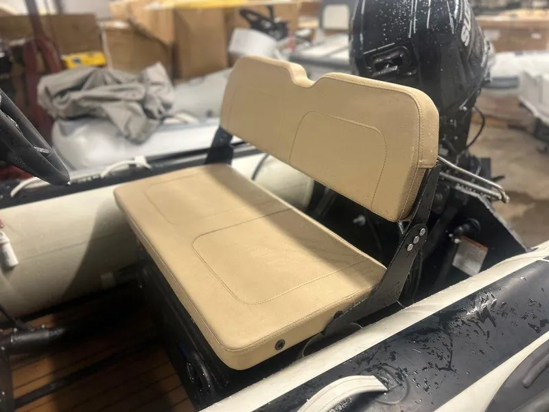Slide: The Image of 2023 Highfield Classic 380 GT Limited boat seat with beige upholstery. - 6