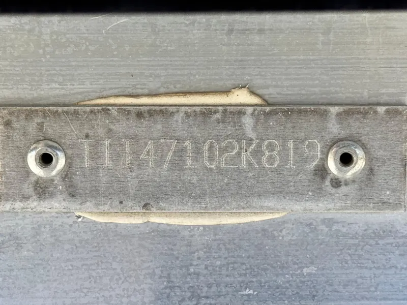 Slide: The Image of Serial number plate on 2019 Manitou 23 Oasis boat. - 30