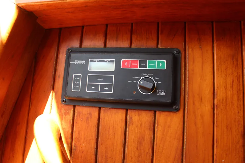 Slide: The Image of Control panel on 1979 Hans Christian 38 Ketch, mounted on wooden surface. - 29