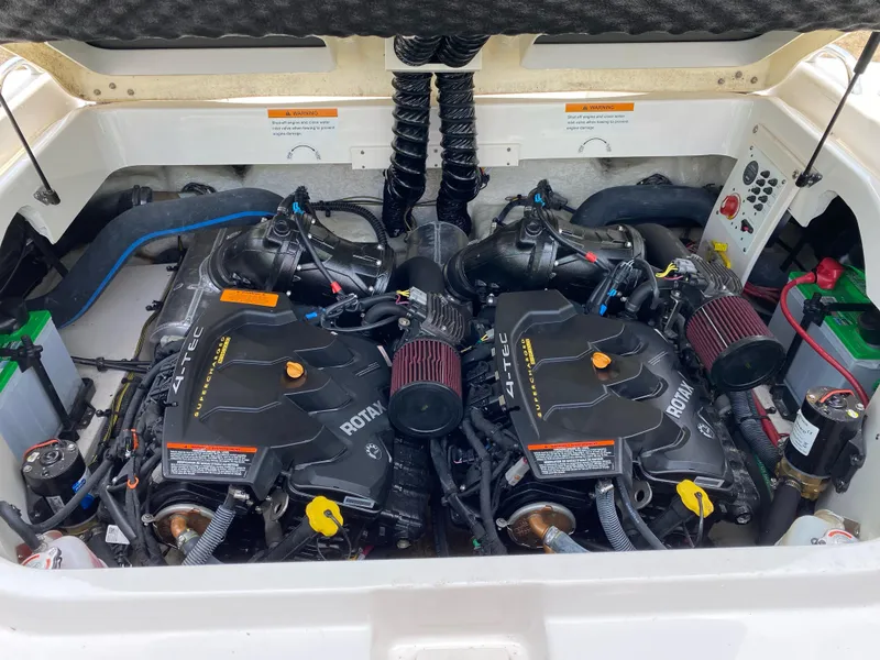 Slide: The Image of Engine compartment of a 2016 Chaparral Vortex 223 VRX with dual Rotax engines. - 12