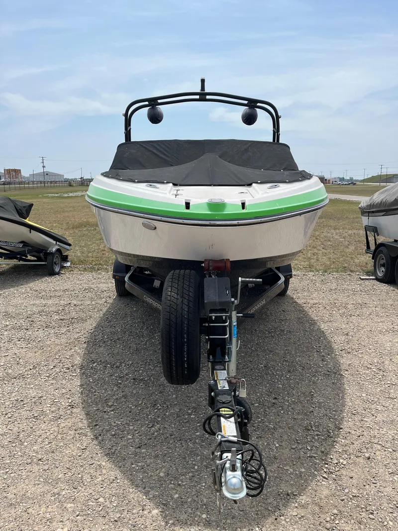 Slide: The Image of 2016 Chaparral Vortex 223 VRX boat on trailer, front view, outdoors. - 2