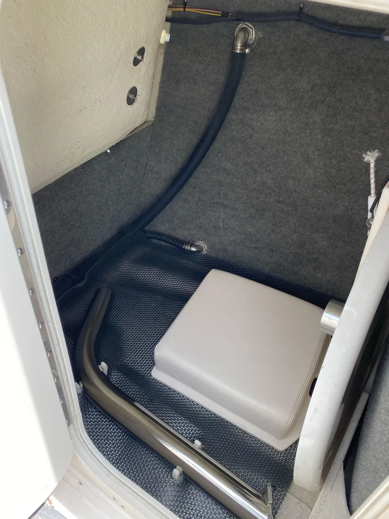 Slide: The Image of Interior storage compartment of 2016 Chaparral Vortex 223 VRX boat. - 9