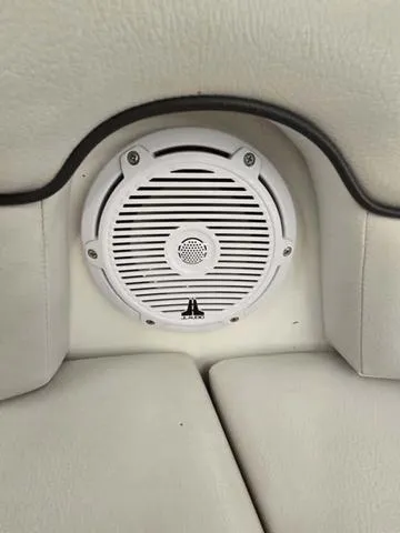 Slide: The Image of White speaker on 2015 Yamaha AR210 boat interior. - 9