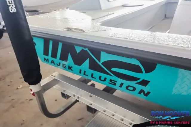 Slide: The Image of 2025 Majek 18 M2 boat with "Majek Illusion" branding on the side. - 20