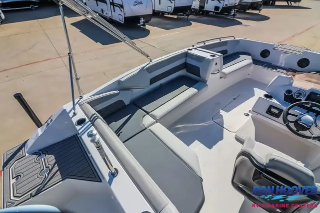 Slide: The Image of 2025 Starcraft SVX171 boat interior with seating and steering wheel, displayed at Ron Hoover RV & Marine. - 10