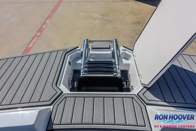 Slide: The Image of 2025 Starcraft SVX171 boat with foldable ladder, showcased at Ron Hoover RV & Marine Centers. - 13
