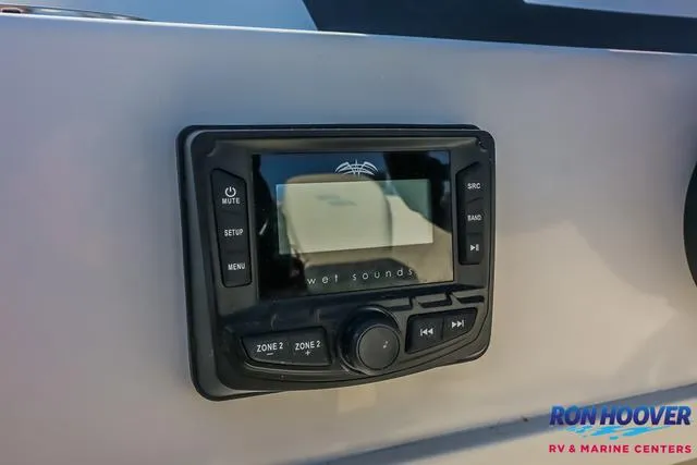 Slide: The Image of 2025 Starcraft SVX171 audio control panel with Wet Sounds system. - 21