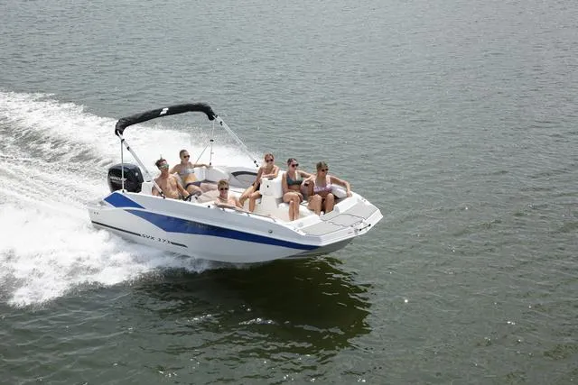 Slide: The Image of 2025 Starcraft SVX171 boat cruising with passengers on a sunny day. - 35
