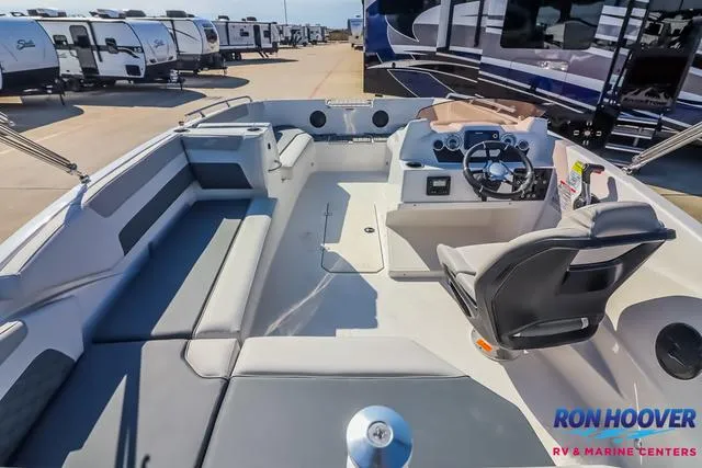 Slide: The Image of 2025 Starcraft SVX171 boat interior with seating and control panel at Ron Hoover RV & Marine Centers. - 9