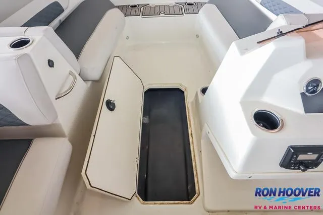 Slide: The Image of 2025 Starcraft SVX171 boat interior with open storage compartment and seating. - 20