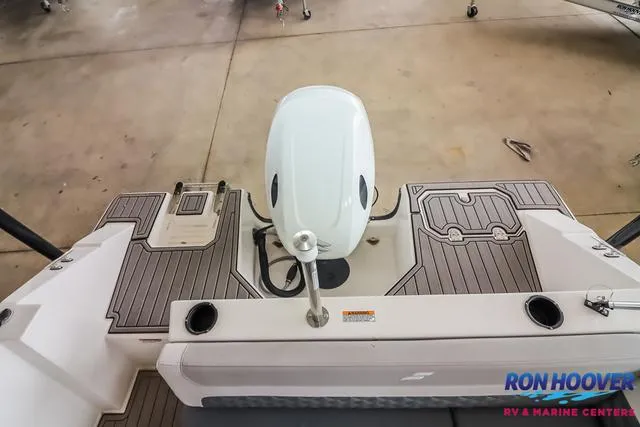 Slide: The Image of 2025 Starcraft SVX171 boat deck with motor, viewed from above at Ron Hoover RV & Marine Center. - 25