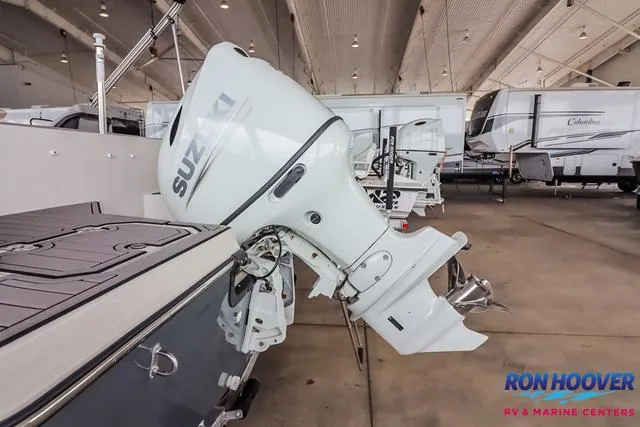 Slide: The Image of Starcraft SVX171 2025 boat with Suzuki outboard motor in showroom. - 30