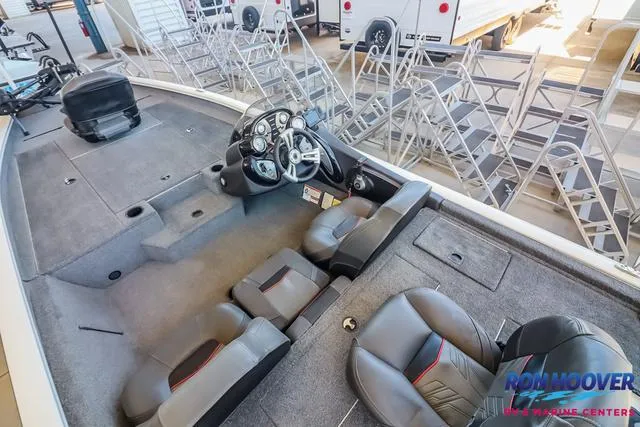 Slide: The Image of 2021 Tracker Pro Team 190 TX TE boat interior with seating and control panel. - 12