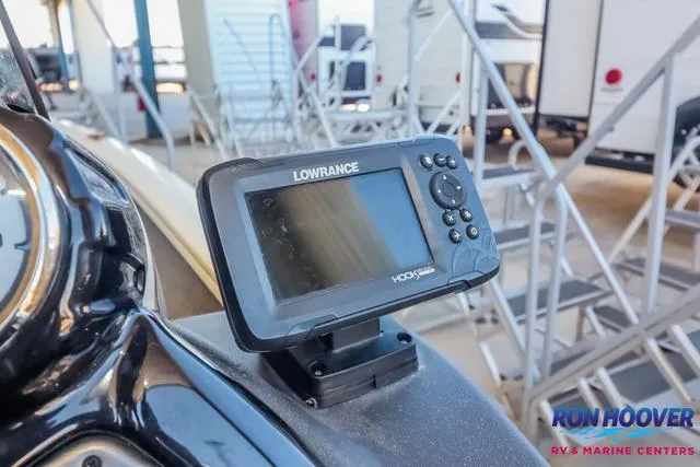 Slide: The Image of Lowrance fish finder on 2021 Tracker Pro Team 190 TX TE boat dashboard. - 21