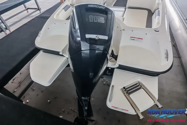 Slide: The Image of 2020 Bayliner Element E18 boat with Mercury 115 engine, rear view. - 29