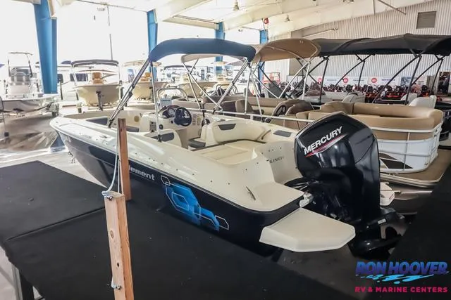 Slide: The Image of 2020 Bayliner Element E18 boat with Mercury engine in showroom. - 5