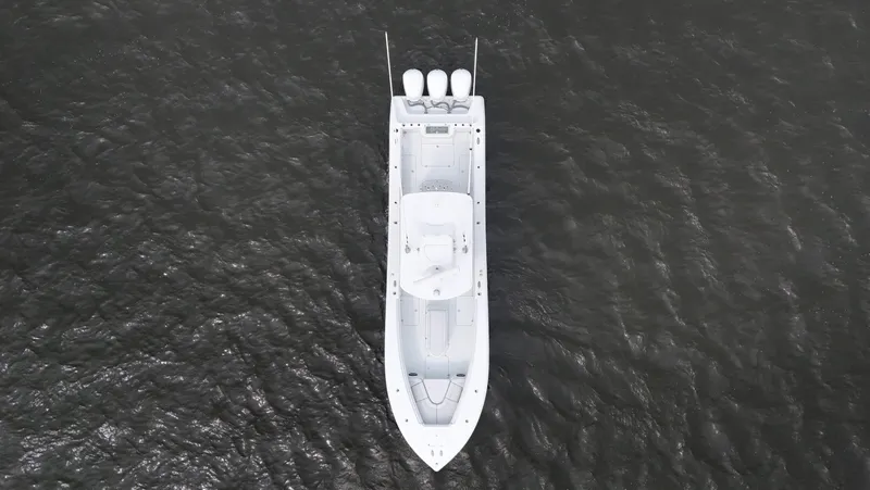 Slide: The Image of Aerial view of 2017 Yellowfin 36 Offshore boat on dark water. - 14