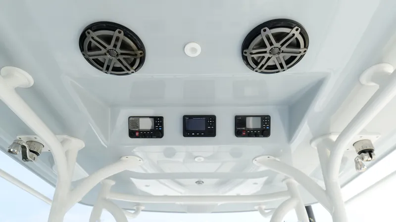 Slide: The Image of 2017 Yellowfin 36 Offshore boat console with speakers and electronic controls. - 17