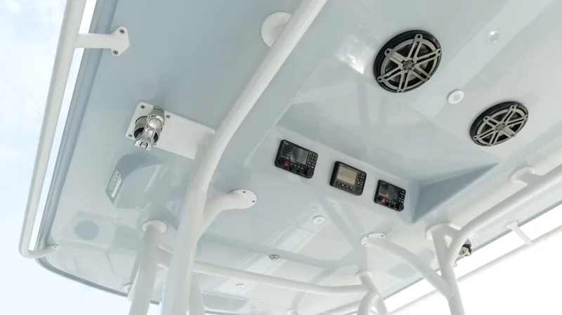 Slide: The Image of 2017 Yellowfin 36 Offshore boat console with electronics and speakers. - 18