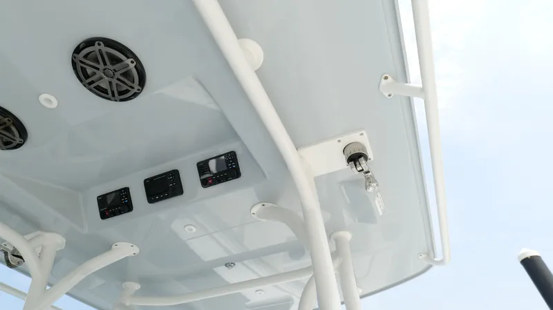 Slide: The Image of 2017 Yellowfin 36 Offshore boat console with speakers and controls. - 19