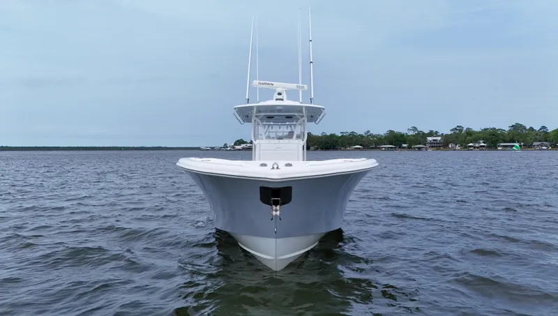 Slide: The Image of 2017 Yellowfin 36 Offshore boat on calm water, front view. - 2