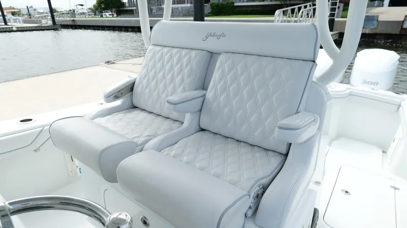 Slide: The Image of 2017 Yellowfin 36 Offshore boat with luxurious quilted seating at the dock. - 21