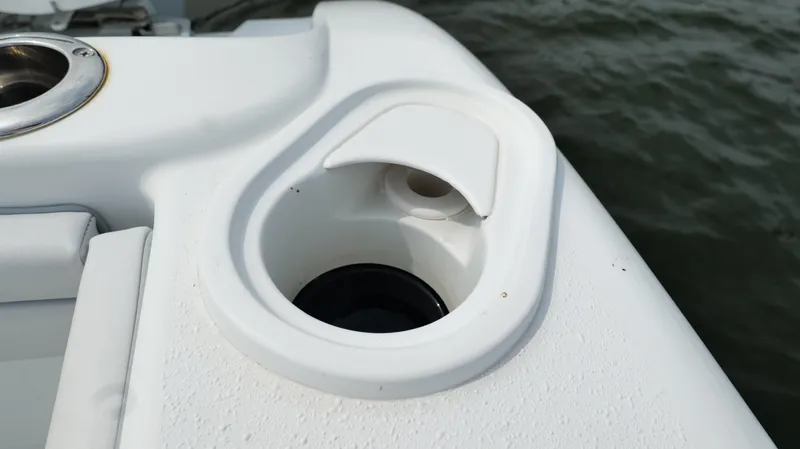 Slide: The Image of Cup holder on 2017 Yellowfin 36 Offshore boat, near water. - 28