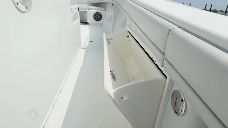 Slide: The Image of 2017 Yellowfin 36 Offshore boat interior with open storage compartment. - 39