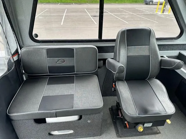 Slide: The Image of Interior of a 2017 Duckworth Pacific Pro 22' boat with black seating. - 6