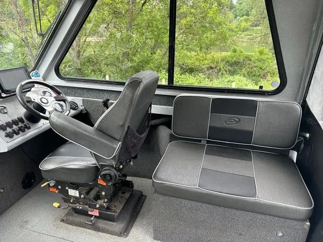 Slide: The Image of Interior of 2017 Duckworth Pacific Pro 22' boat with seating and control panel. - 7