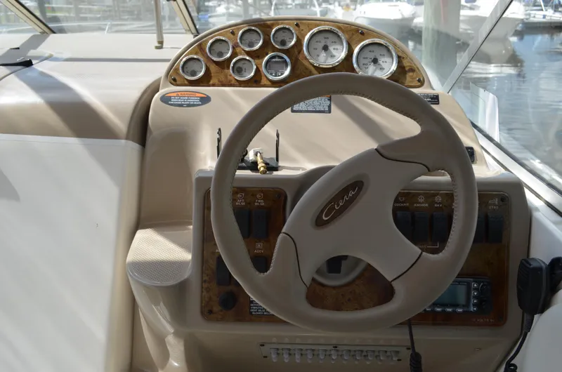 Slide: The Image of 2001 Bayliner 2655 Ciera helm with steering wheel and instrument panel. - 18