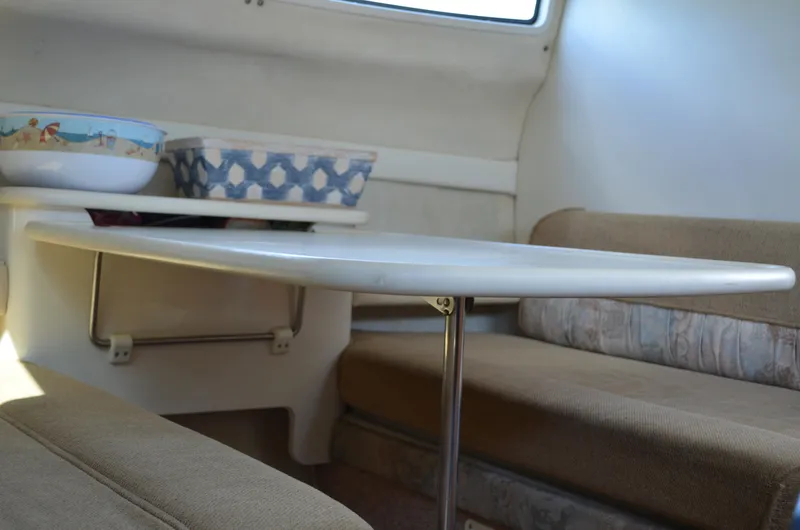 Slide: The Image of Interior of 2001 Bayliner 2655 Ciera boat with dining area and seating. - 39