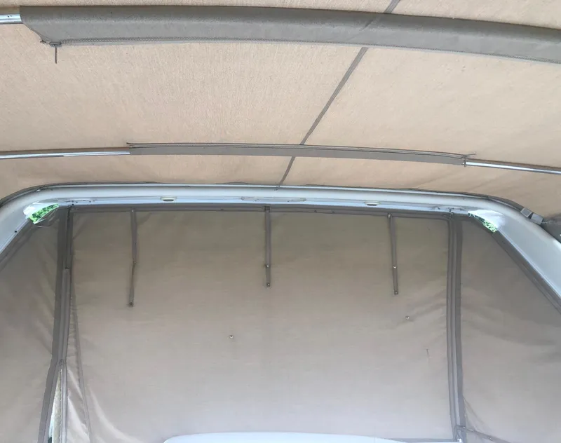 Slide: The Image of Interior view of 2000 Carver 450 Voyager Pilothouse boat canopy. - 34