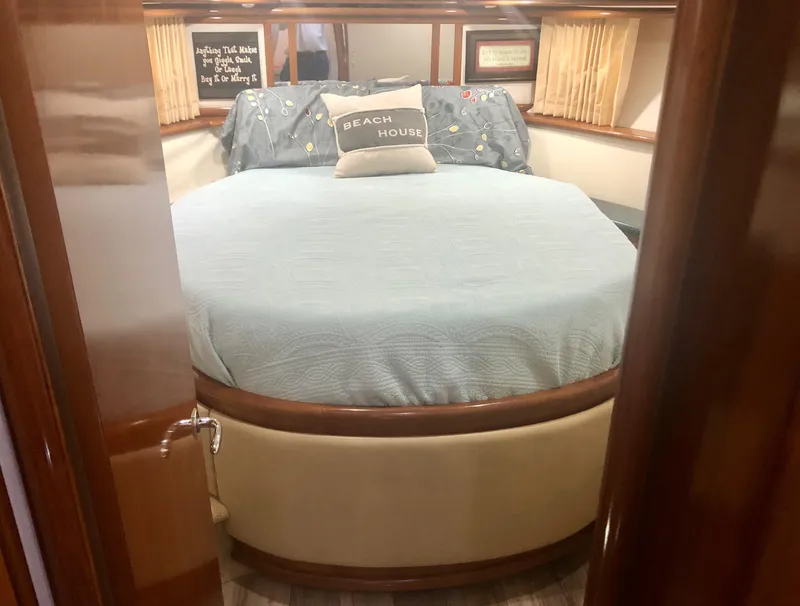 Slide: The Image of Cozy bedroom in 2000 Carver 450 Voyager Pilothouse yacht with nautical decor. - 50