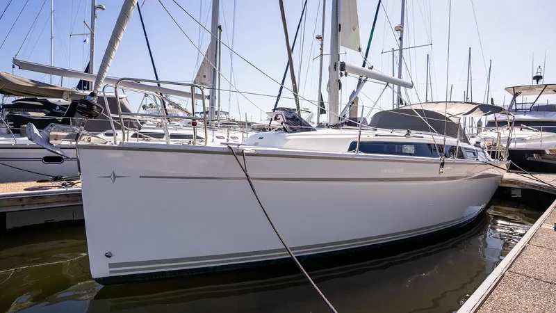 The Image of 2020 Bavaria Cruiser 34 sailboat docked at marina, side view. - 0