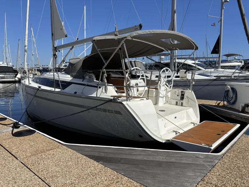 Slide: The Image of 2020 Bavaria Cruiser 34 yacht docked at marina under clear blue sky. - 18