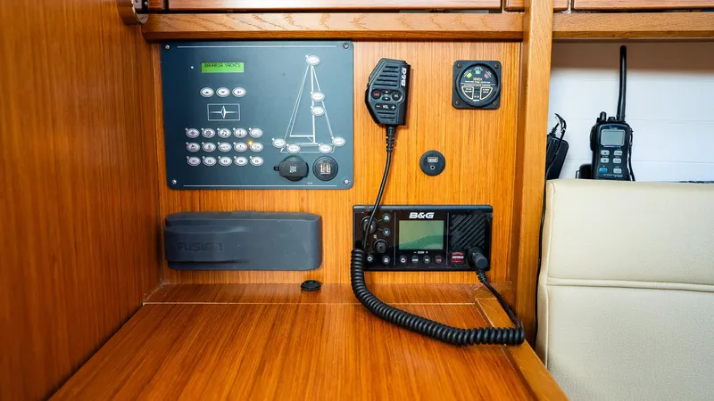 Slide: The Image of Control panel of 2020 Bavaria Cruiser 34 yacht with communication equipment. - 26