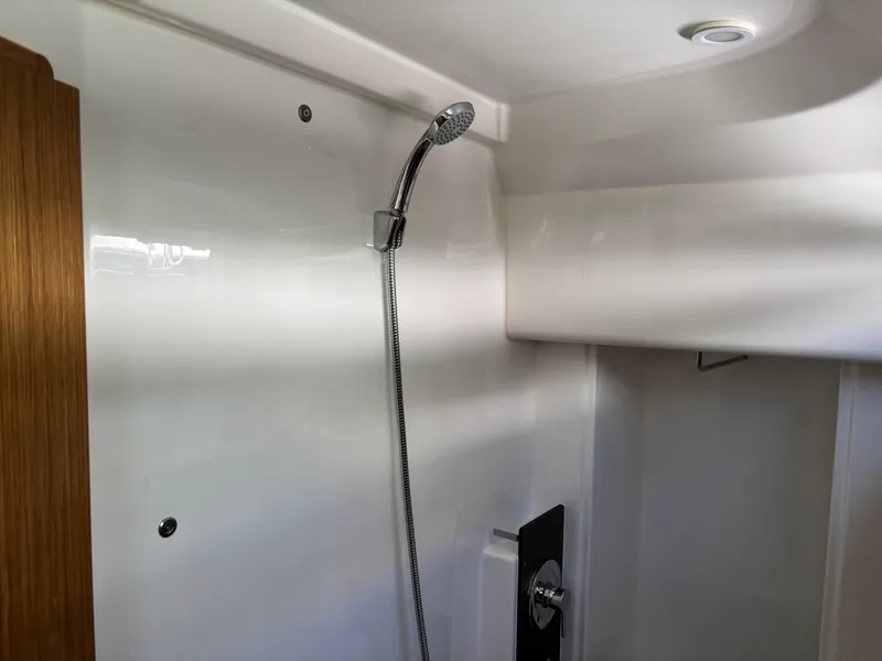 Slide: The Image of Interior shower of 2020 Bavaria Cruiser 34 yacht, featuring modern fixtures. - 36