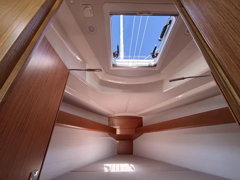 Slide: The Image of Interior cabin view of 2020 Bavaria Cruiser 34 yacht with skylight and wooden finish. - 40
