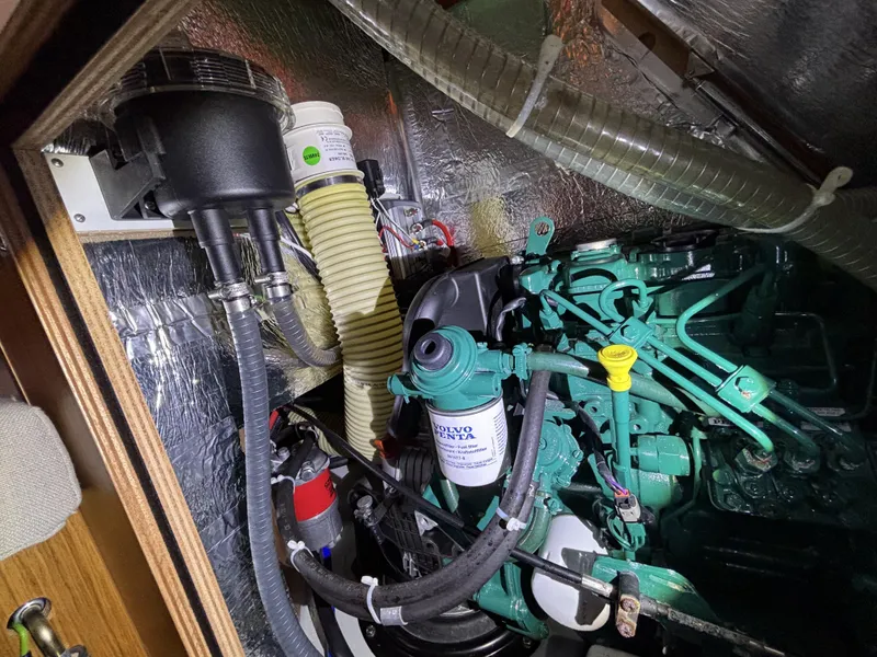 Slide: The Image of Engine compartment of a 2020 Bavaria Cruiser 34 sailboat, featuring a Volvo Penta engine. - 46