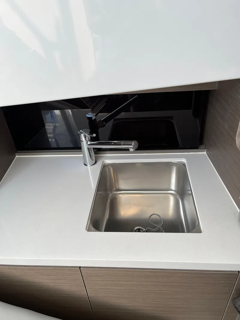 Slide: The Image of 2024 Beneteau Flyer 9 SUNdeck kitchen sink with modern faucet. - 28